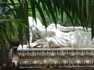 Buddha statue, gardens at Kabiki Hotel, Phnom Penh, Cambodia