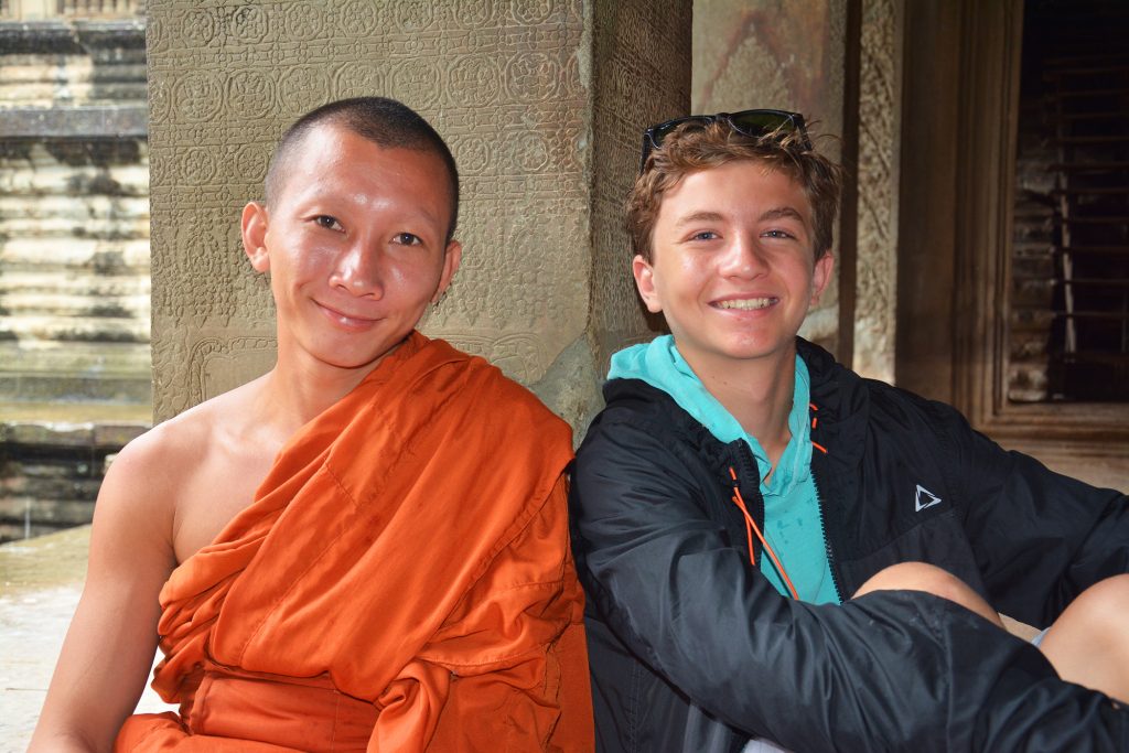 Seamus with monk at Angkor Wat in Cambodia