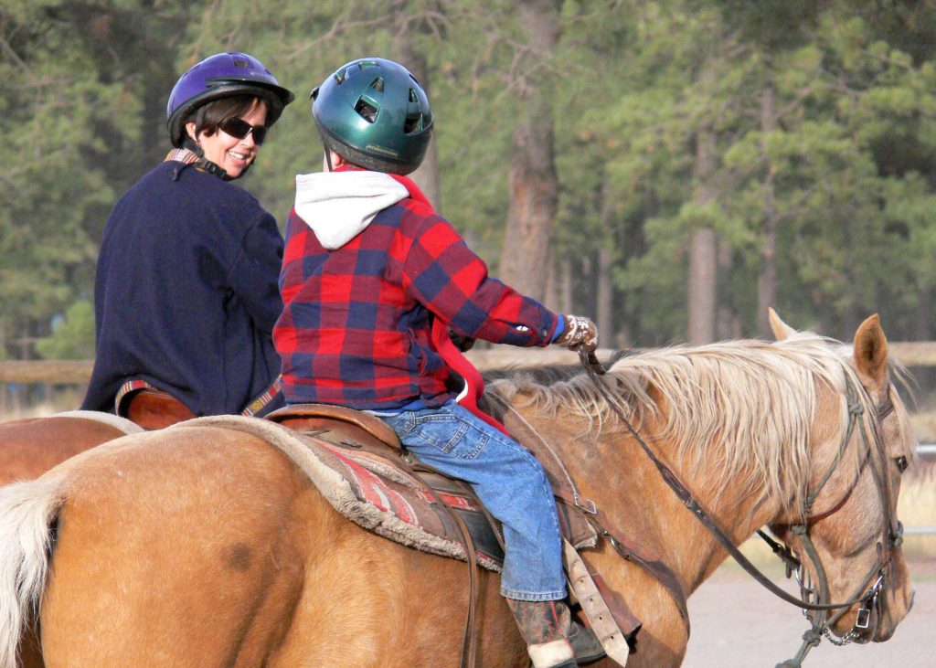 Seamus and Carrie on a family vacation on a dude ranch